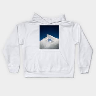 Ice formation illuminated by sun light Kids Hoodie